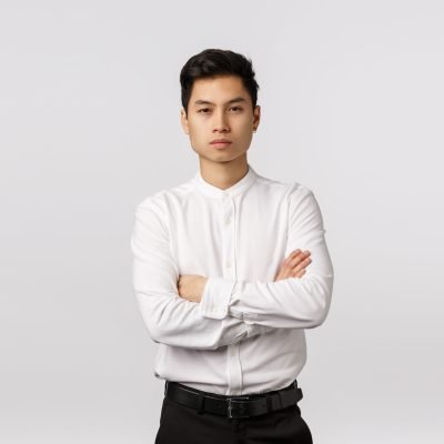 Corporate promo, recruitment and business concept. Attractive self-assured asian male entrepreneur, cross arms over chest, look camera focused and confident, able handle any task, solve problems Corporate promo, recruitment and business concept. Attractive self-assured asian male entrepreneur, cross arms over chest, look camera focused and confident, able handle any task, solve problems.